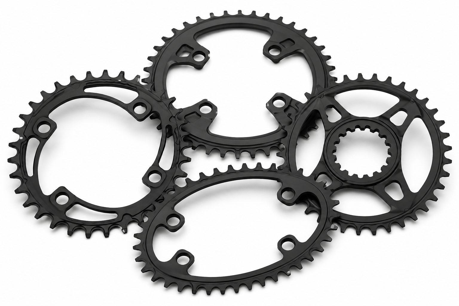 Different bicycle chainrings including narrow-wide, round and oval chainrings